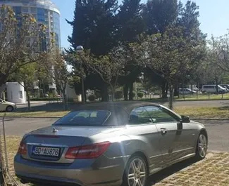 Mercedes-Benz E-Class Cabrio 2011 available for rent in Rafailovici, with unlimited mileage limit.