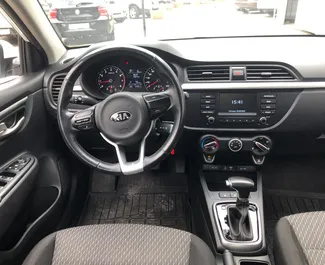 Kia Rio 2018 car hire in Russia, featuring ✓ Petrol fuel and 99 horsepower ➤ Starting from 2300 RUB per day.
