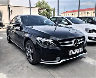 Front view of a rental Mercedes-Benz C180 in Adler, Russia ✓ Car #1932. ✓ Automatic TM ✓ 0 reviews.