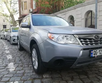 Petrol 2.5L engine of Subaru Forester 2012 for rental in Tbilisi.