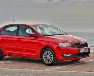 Front view of a rental Skoda Rapid in Budva, Montenegro ✓ Car #491. ✓ Automatic TM ✓ 18 reviews.