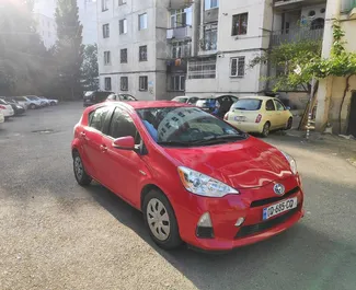 Front view of a rental Toyota Prius C in Tbilisi, Georgia ✓ Car #2015. ✓ Automatic TM ✓ 0 reviews.
