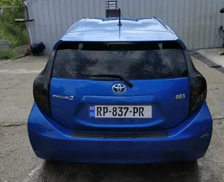 Toyota Prius C 2013 car hire in Georgia, featuring ✓ Hybrid fuel and 73 horsepower ➤ Starting from 63 GEL per day.