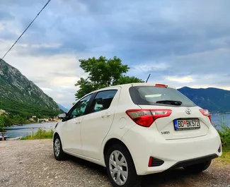 Toyota Yaris 2020 car hire in Montenegro, featuring ✓ Petrol fuel and 82 horsepower ➤ Starting from 25 EUR per day.