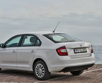 Skoda Rapid 2019 car hire in Montenegro, featuring ✓ Petrol fuel and 110 horsepower ➤ Starting from 25 EUR per day.
