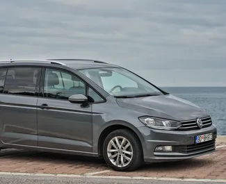 Front view of a rental Volkswagen Touran in Budva, Montenegro ✓ Car #2004. ✓ Automatic TM ✓ 9 reviews.