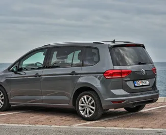 Volkswagen Touran 2016 car hire in Montenegro, featuring ✓ Diesel fuel and 85 horsepower ➤ Starting from 30 EUR per day.