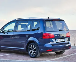 Volkswagen Touran 2014 car hire in Montenegro, featuring ✓ Diesel fuel and 100 horsepower ➤ Starting from 30 EUR per day.