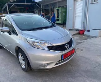Front view of a rental Nissan Note in Limassol, Cyprus ✓ Car #2080. ✓ Automatic TM ✓ 5 reviews.