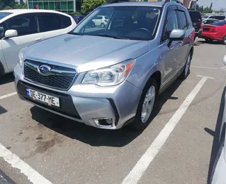 Petrol 2.5L engine of Subaru Forester 2015 for rental in Tbilisi.