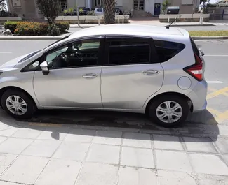 Front view of a rental Nissan Note in Limassol, Cyprus ✓ Car #2048. ✓ Automatic TM ✓ 1 reviews.