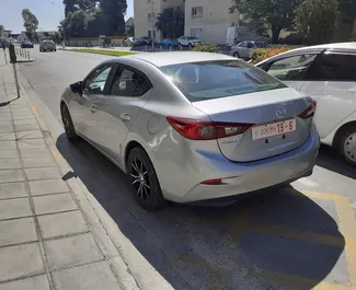 Mazda Axela rental. Comfort, Premium Car for Renting in Cyprus ✓ Deposit of 450 EUR ✓ TPL, CDW, Young insurance options.