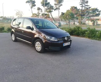 Front view of a rental Volkswagen Touran in Bar, Montenegro ✓ Car #2045. ✓ Automatic TM ✓ 16 reviews.