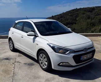 Front view of a rental Hyundai i20 in Budva, Montenegro ✓ Car #1067. ✓ Automatic TM ✓ 2 reviews.