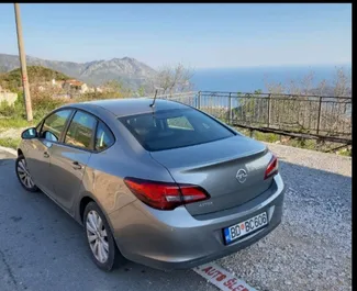 Car Hire Opel Astra #2026 Automatic in Budva, equipped with 1.6L engine ➤ From Vuk in Montenegro.