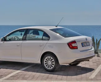 Skoda Rapid 2019 car hire in Montenegro, featuring ✓ Petrol fuel and 81 horsepower ➤ Starting from 25 EUR per day.