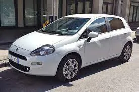 Front view of a rental Fiat Punto in Durres, Albania ✓ Car #2151. ✓ Manual TM ✓ 4 reviews.