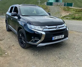 Front view of a rental Mitsubishi Outlander Xl in Tbilisi, Georgia ✓ Car #1352. ✓ Automatic TM ✓ 0 reviews.