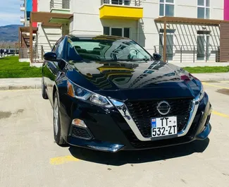 Front view of a rental Nissan Altima in Tbilisi, Georgia ✓ Car #2056. ✓ Automatic TM ✓ 1 reviews.