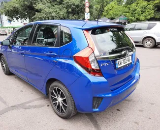 Front view of a rental Honda Fit in Tbilisi, Georgia ✓ Car #368. ✓ Automatic TM ✓ 1 reviews.