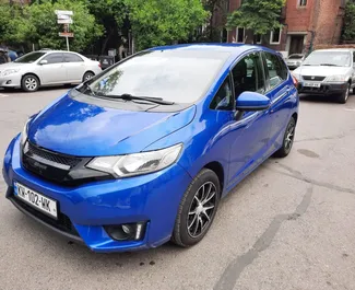 Honda Fit 2015 car hire in Georgia, featuring ✓ Petrol fuel and 117 horsepower ➤ Starting from 100 GEL per day.