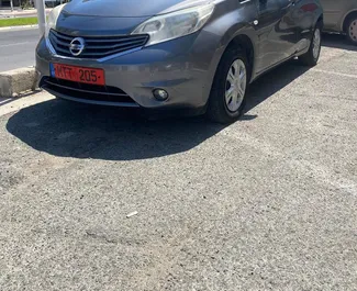 Front view of a rental Nissan Note in Limassol, Cyprus ✓ Car #2264. ✓ Automatic TM ✓ 1 reviews.