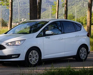 Front view of a rental Ford C-Max in Budva, Montenegro ✓ Car #2187. ✓ Manual TM ✓ 1 reviews.