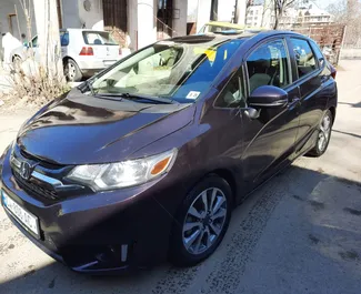 Front view of a rental Honda Fit in Tbilisi, Georgia ✓ Car #2237. ✓ Automatic TM ✓ 1 reviews.