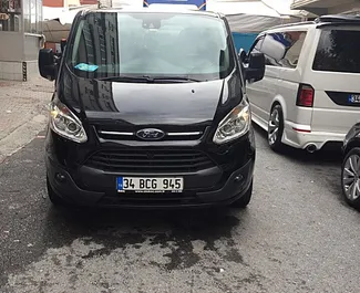 Front view of a rental Ford Tourneo Custom at Antalya Airport, Turkey ✓ Car #2176. ✓ Automatic TM ✓ 0 reviews.