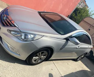 Front view of a rental Hyundai Sonata in Tbilisi, Georgia ✓ Car #2372. ✓ Automatic TM ✓ 0 reviews.
