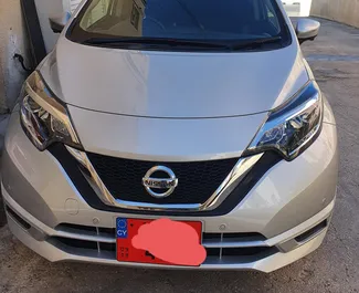 Front view of a rental Nissan Note in Paphos, Cyprus ✓ Car #2302. ✓ Automatic TM ✓ 5 reviews.