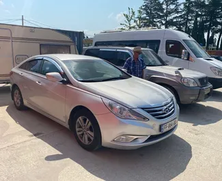 Hyundai Sonata 2014 car hire in Georgia, featuring ✓ Gas fuel and 150 horsepower ➤ Starting from 135 GEL per day.