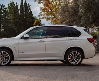Front view of a rental BMW X5 in Becici, Montenegro ✓ Car #2491. ✓ Automatic TM ✓ 0 reviews.