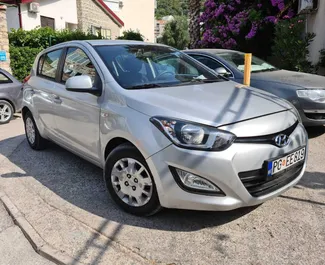 Front view of a rental Hyundai i20 in Bar, Montenegro ✓ Car #2528. ✓ Automatic TM ✓ 9 reviews.