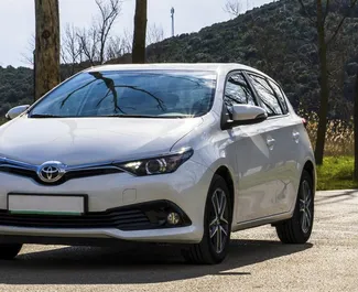 Front view of a rental Toyota Auris in Becici, Montenegro ✓ Car #2466. ✓ Automatic TM ✓ 1 reviews.