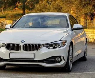Front view of a rental BMW 428i Cabrio in Becici, Montenegro ✓ Car #2476. ✓ Automatic TM ✓ 0 reviews.