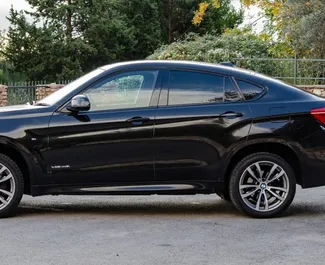 Car Hire BMW X6 #2492 Automatic in Becici, equipped with 3.0L engine ➤ From Ivan in Montenegro.