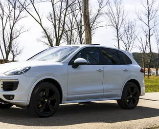 Front view of a rental Porsche Cayenne in Becici, Montenegro ✓ Car #2488. ✓ Automatic TM ✓ 0 reviews.