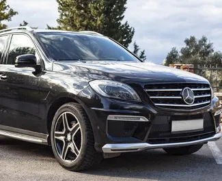 Front view of a rental Mercedes-Benz ML350 in Becici, Montenegro ✓ Car #2493. ✓ Automatic TM ✓ 0 reviews.