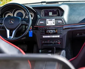 Interior of Mercedes-Benz E-Class Cabrio for hire in Montenegro. A Great 2-seater car with a Automatic transmission.