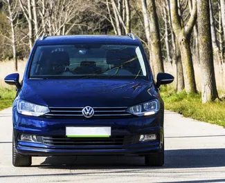 Front view of a rental Volkswagen Touran in Becici, Montenegro ✓ Car #2496. ✓ Automatic TM ✓ 0 reviews.