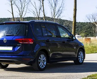 Volkswagen Touran rental. Comfort, Minivan Car for Renting in Montenegro ✓ Deposit of 200 EUR ✓ TPL, Passengers, Theft insurance options.