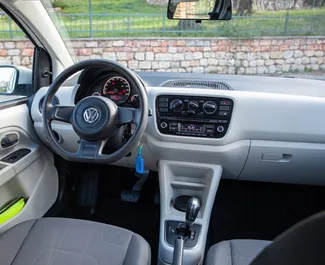 Petrol 1.0L engine of Volkswagen Up 2015 for rental in Becici.