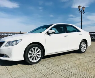 Front view of a rental Toyota Camry in Simferopol, Crimea ✓ Car #2688. ✓ Automatic TM ✓ 0 reviews.