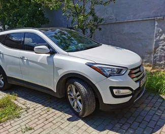 Front view of a rental Hyundai Santa Fe in Simferopol, Crimea ✓ Car #3074. ✓ Automatic TM ✓ 0 reviews.