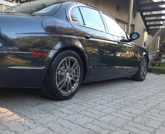 Jaguar S-Type 2010 car hire in Crimea, featuring ✓ Petrol fuel and 200 horsepower ➤ Starting from 2183 RUB per day.