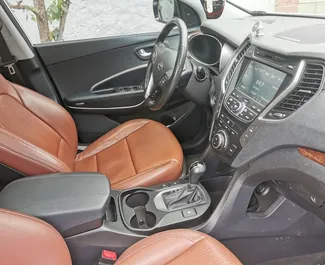 Hyundai Santa Fe rental. Comfort, Crossover Car for Renting in Crimea ✓ Deposit of 30000 RUB ✓ TPL insurance options.