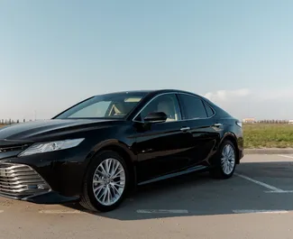 Front view of a rental Toyota Camry in Simferopol, Crimea ✓ Car #2749. ✓ Automatic TM ✓ 0 reviews.