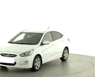Front view of a rental Hyundai Solaris in Kerch, Crimea ✓ Car #2746. ✓ Automatic TM ✓ 0 reviews.