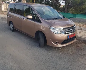 Front view of a rental Nissan Serena in Paphos, Cyprus ✓ Car #2679. ✓ Automatic TM ✓ 0 reviews.